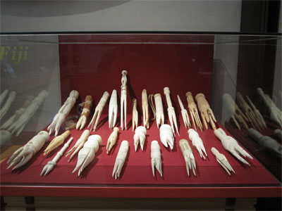 Museum vitrine with newly carved cannibal forks